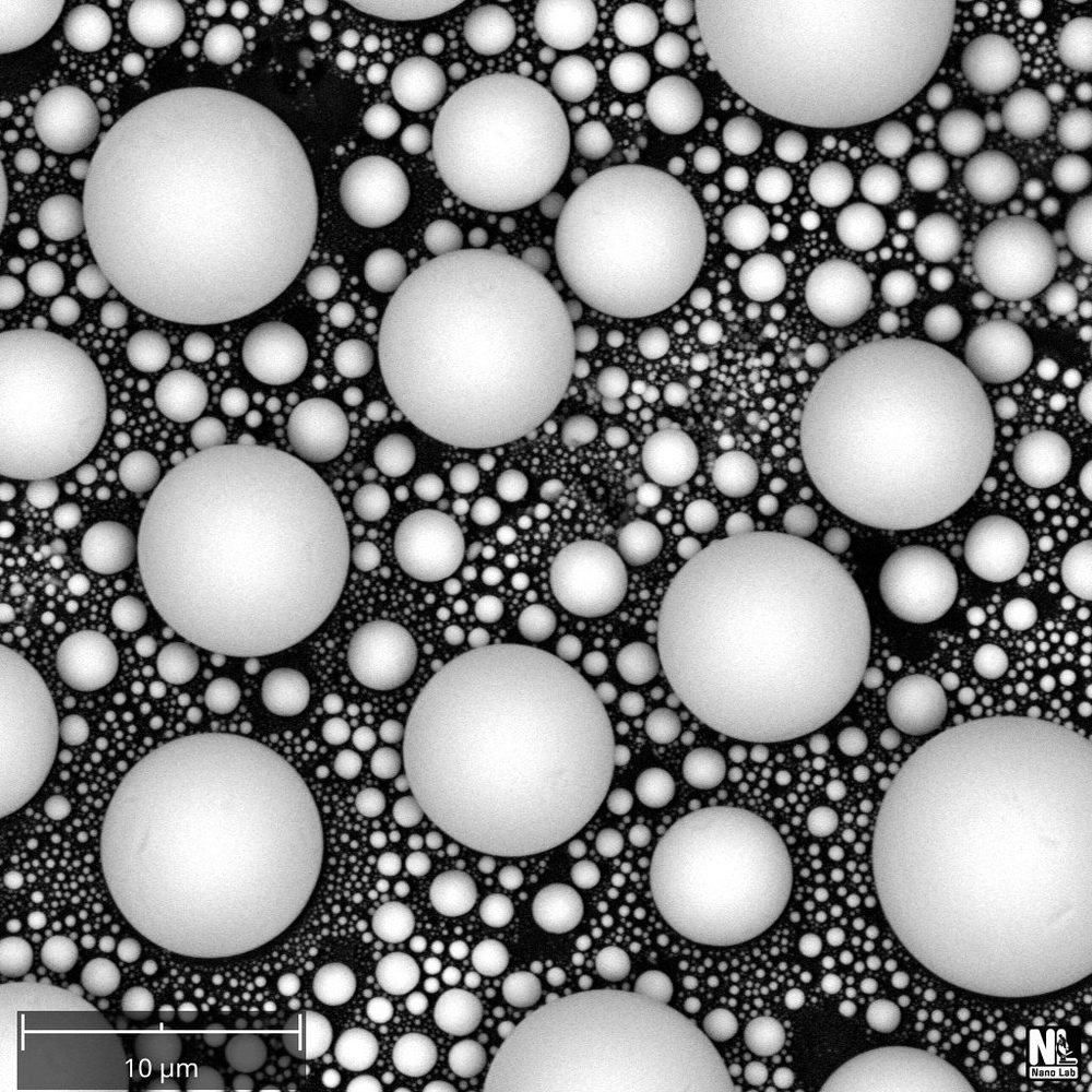 Tin microspheres on carbon, SEM.